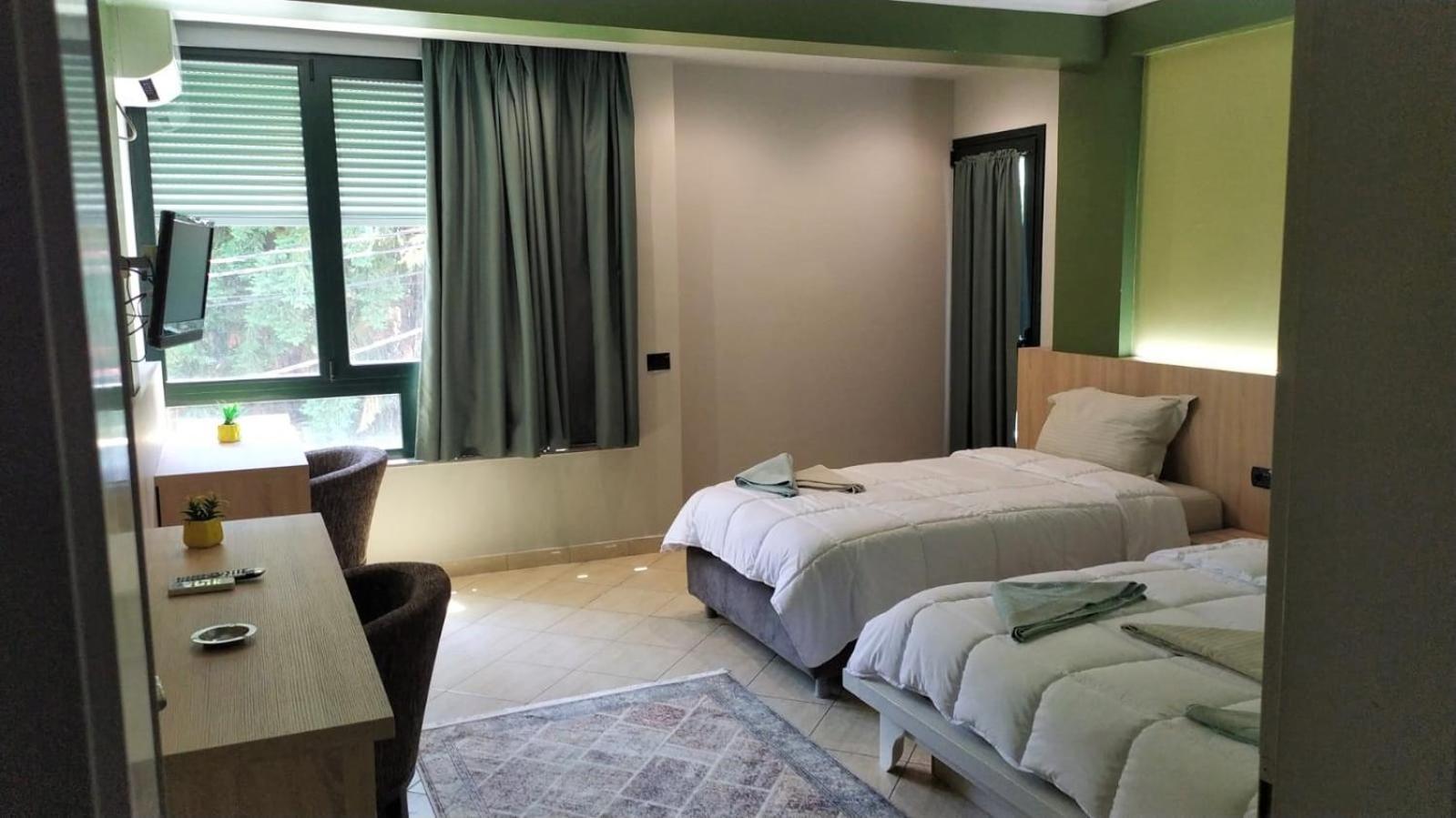 Luander Hotel Tirana Zimmer foto